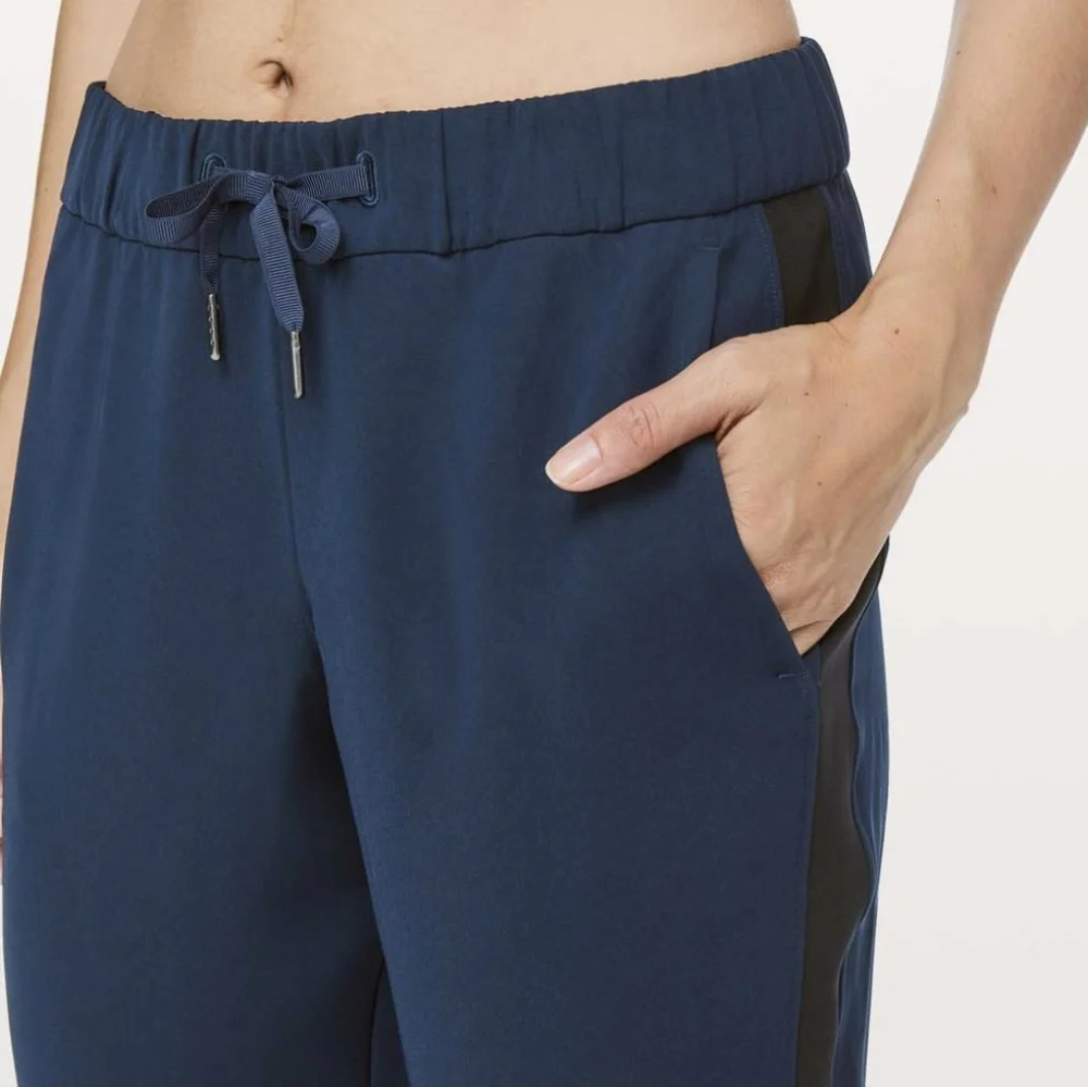 Lululemon Athletica On the Fly Woven Navy with Black Track Stripe Pants